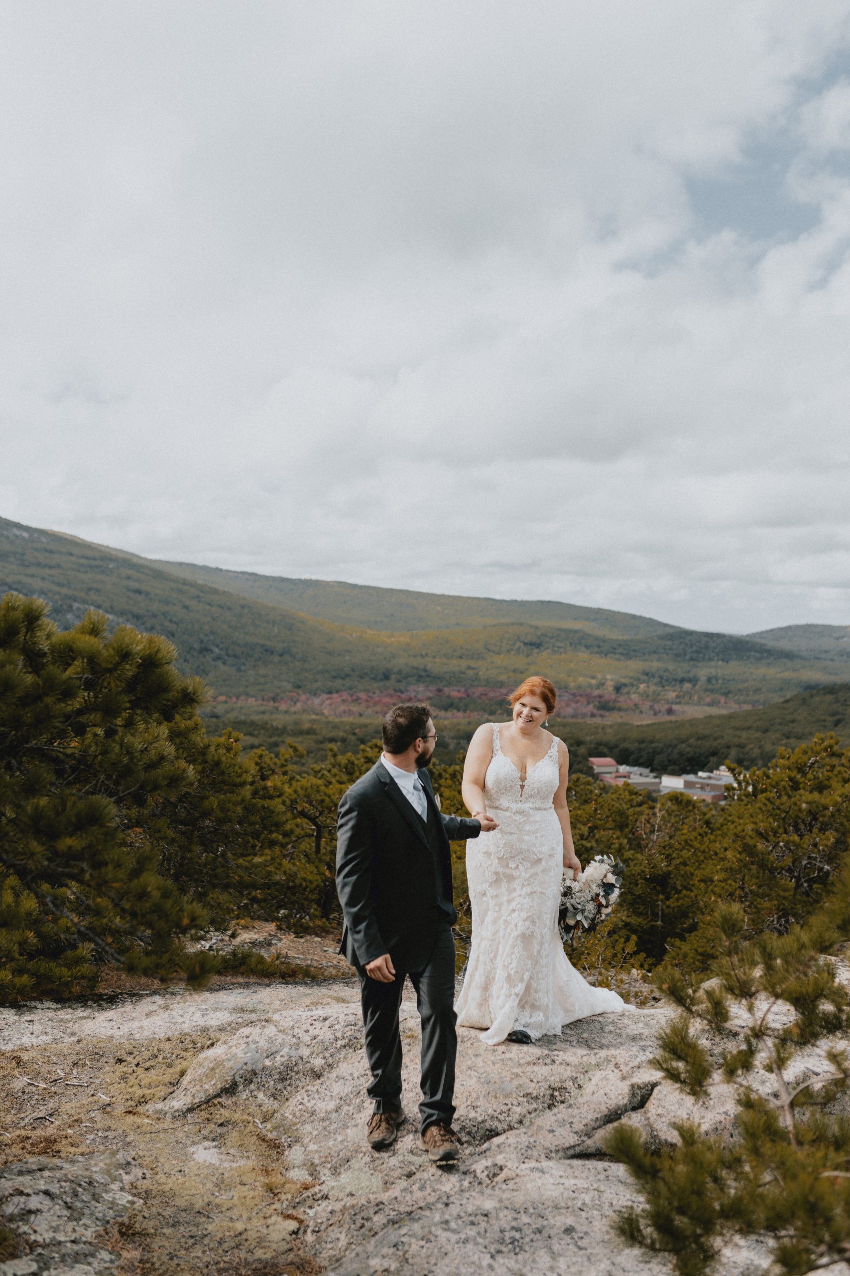 Couple Hiking in Acadia National Park in wedding attire