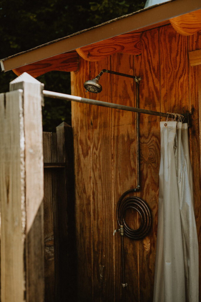An outdoor shower in the morning.